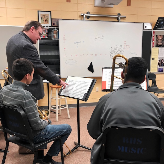 Tubist Tom Holtz leading a workshop with students.