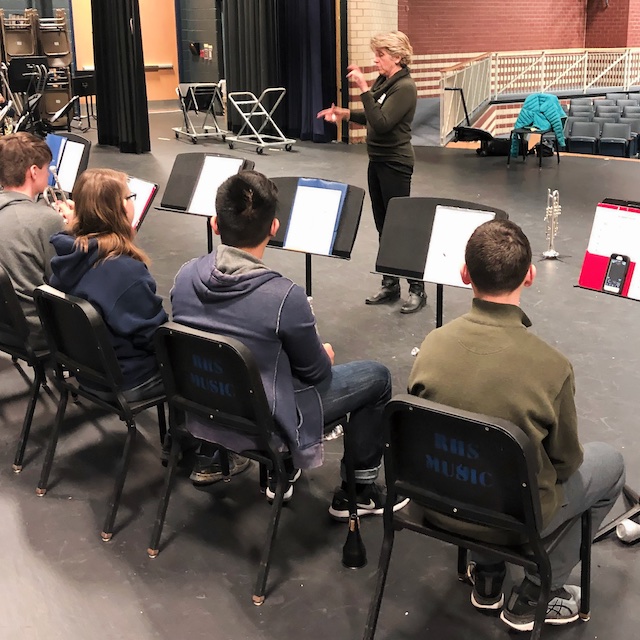 Trumpeter Ginger Turner leading a workshop with students.