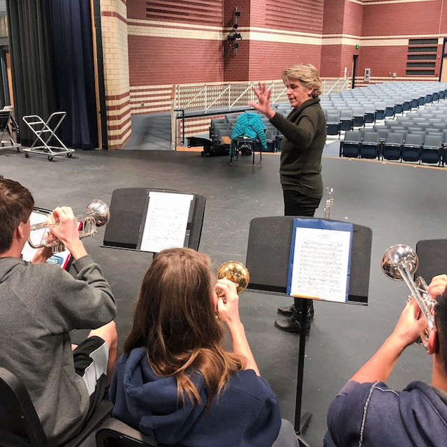 Trumpeter Ginger Turner leading a workshop with students.