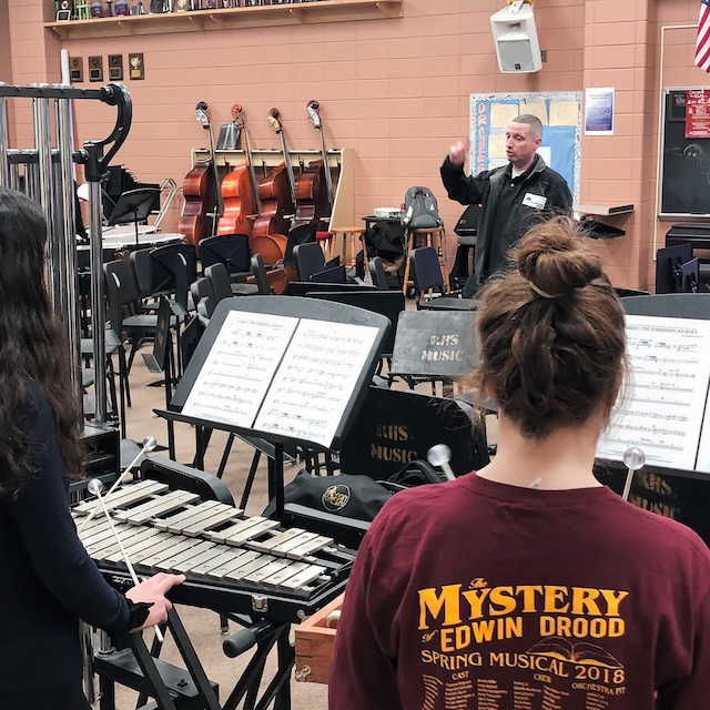 Percussionist Kris Betz leading a workshop with students.