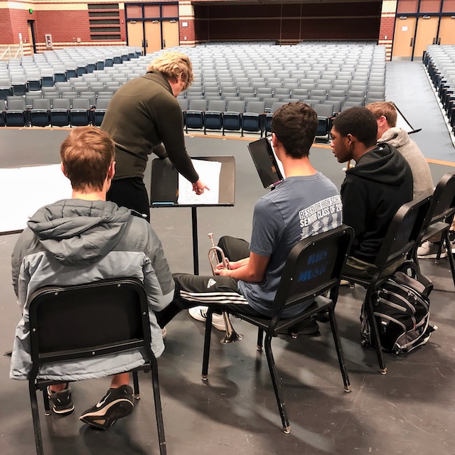 Trumpeter Ginger Turner leading a workshop with students.